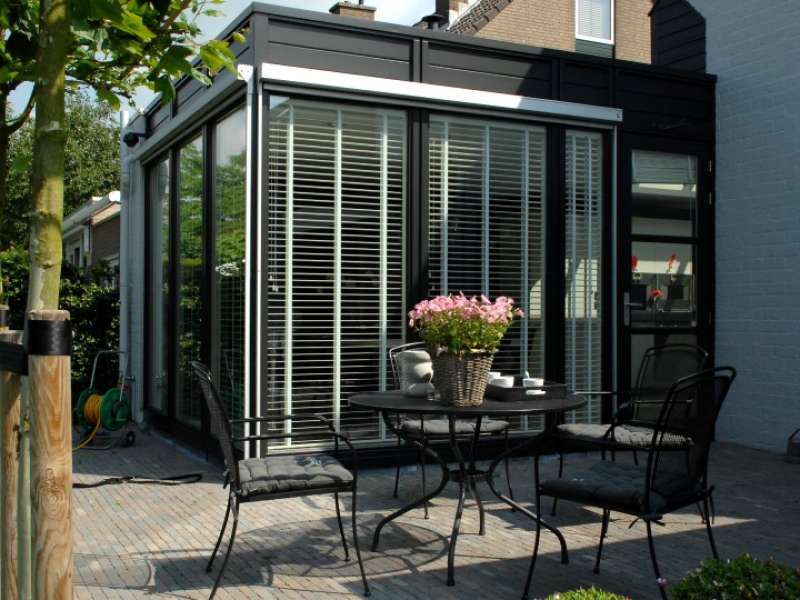 Overdekte veranda en verbouwing van de woning