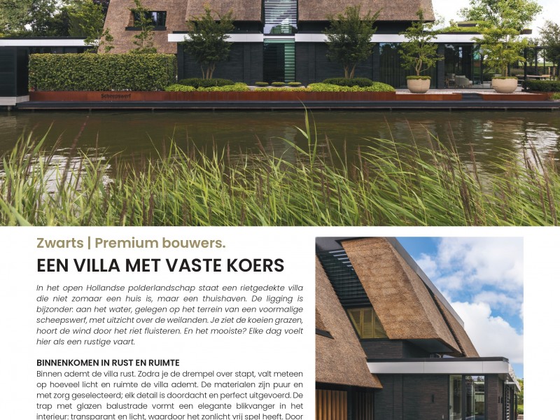 Rietgedekte villa aan het water